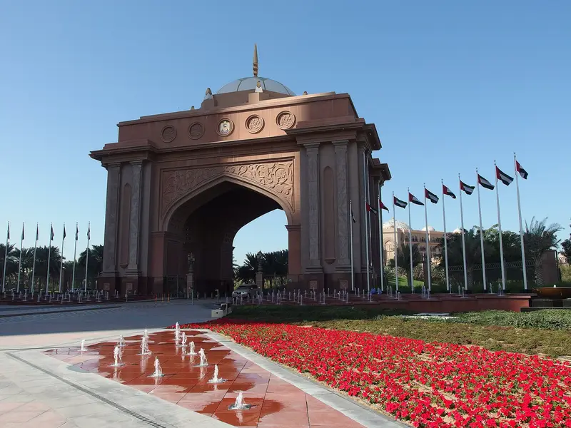 The red sandstone entrance gate of Emirates Palace in Abu Dhabi