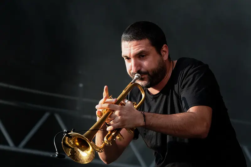 Ibrahim Maalouf playing the trumpet on stage